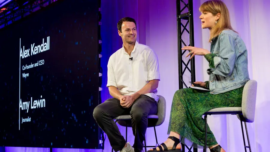Alex Kendall and Amy Lewin speaking at the ARIA Summit 2025